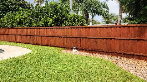 Mahogany Stained Wood Privacy Fence