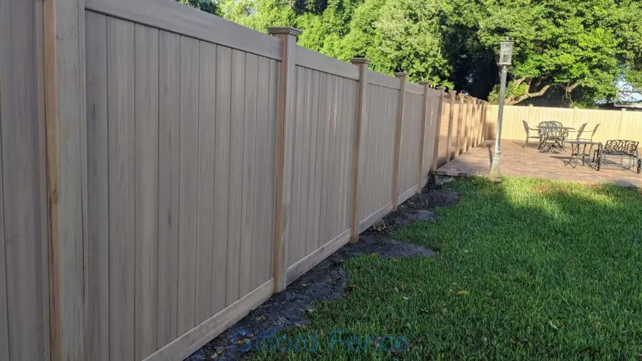 Wood Look Vinyl Privacy Fence Installation in Avalon Park by Gifford Fence