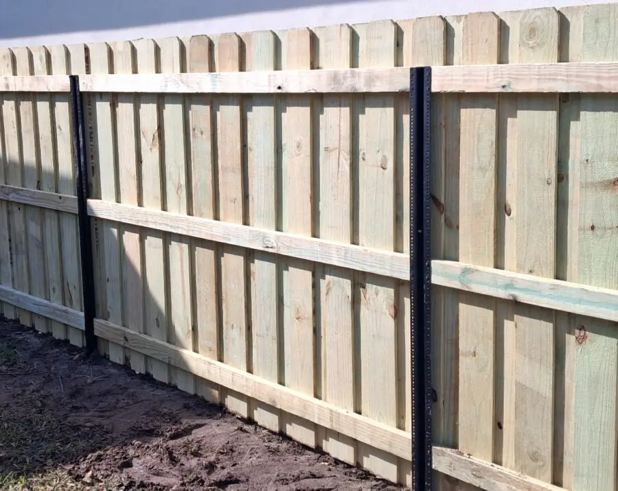 Custom Board on Board Wood Privacy Fence with PostMaster Metal Posts