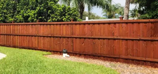 Mahogany Stained Wood Privacy Fence